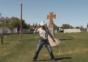 Cowboy mit Peitsche und Mundharmonika