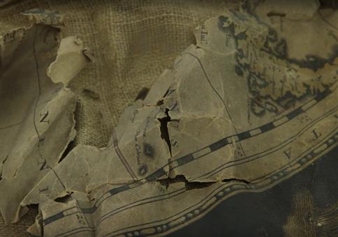 Zerstörte Landkarte aus dem 17. Jahrhundert restaurieren