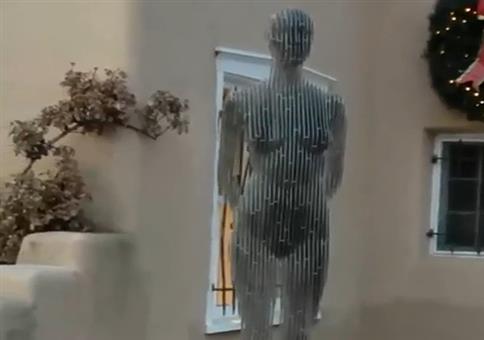 Optische Illusion: Statue