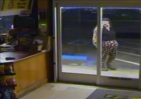 Dicker Typ will Laden ausrauben