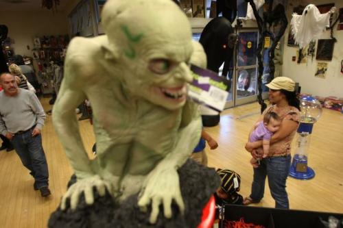 BURBANK, CA - OCTOBER 21:  A Halloween Adventure store, located in a defunct Circuit City consumer electronics store building, sells costumes, props and accessories for Halloween revelers on October 21, 2009 in Burbank, California. Shoppers are predicted to spend an average of $56.31 on holiday merchandise, down from $66.54 a year ago. That would bring the total Halloween spending to about $4.75 billion. Last year brought in $5.77 billion. Halloween Adventure is a national chain of temporary Halloween merchandise stores that open each year for the Halloween buying season.  (Photo by David McNew/ Getty Images)